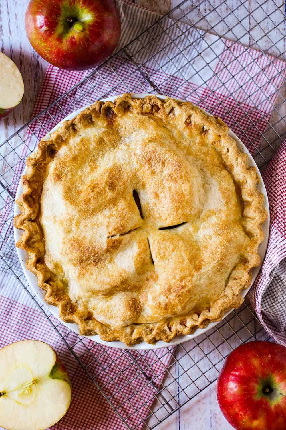 An overhead view of a freshly bake homemade apple pie. 