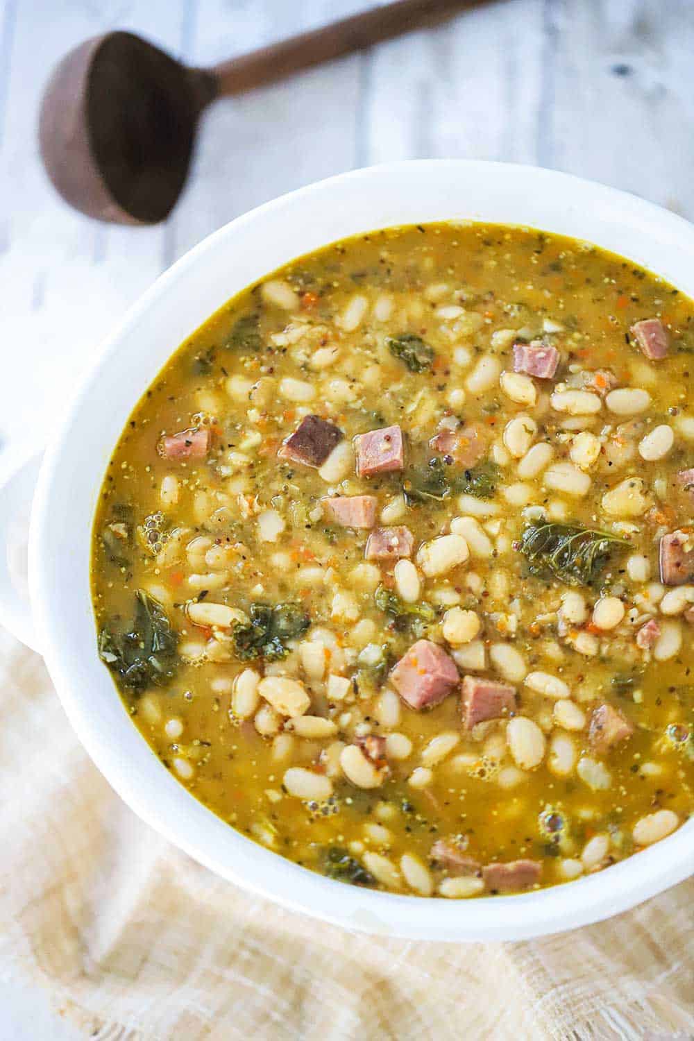 Smoked ham, kale and white bean stew