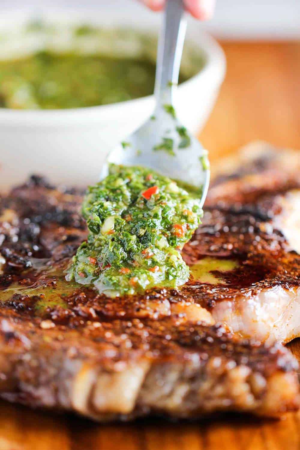 grilled cowboy ribeye steak with chimichurri sauce