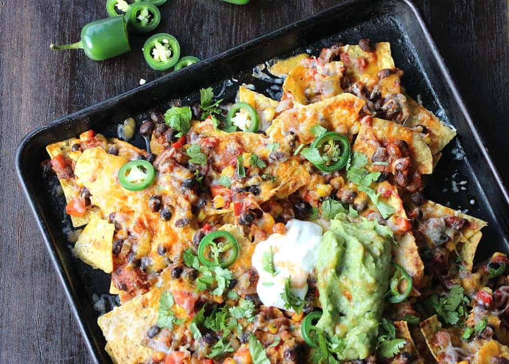 Vegetarian Nachos on a large baking sheet. 