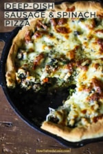 A cast-iron skillet filled with a deep-dish sausage and spinach pizza with a slice missing.