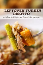 A dinner fork that has pierced roasted asparagus, left-over turkey, and butternut squash, and is being raised up.