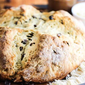 Irish Soda Bread next to a knife and a jar of jam