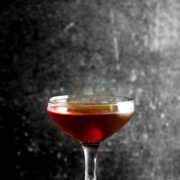 A glass filled with a Classic Manhattan Cocktail