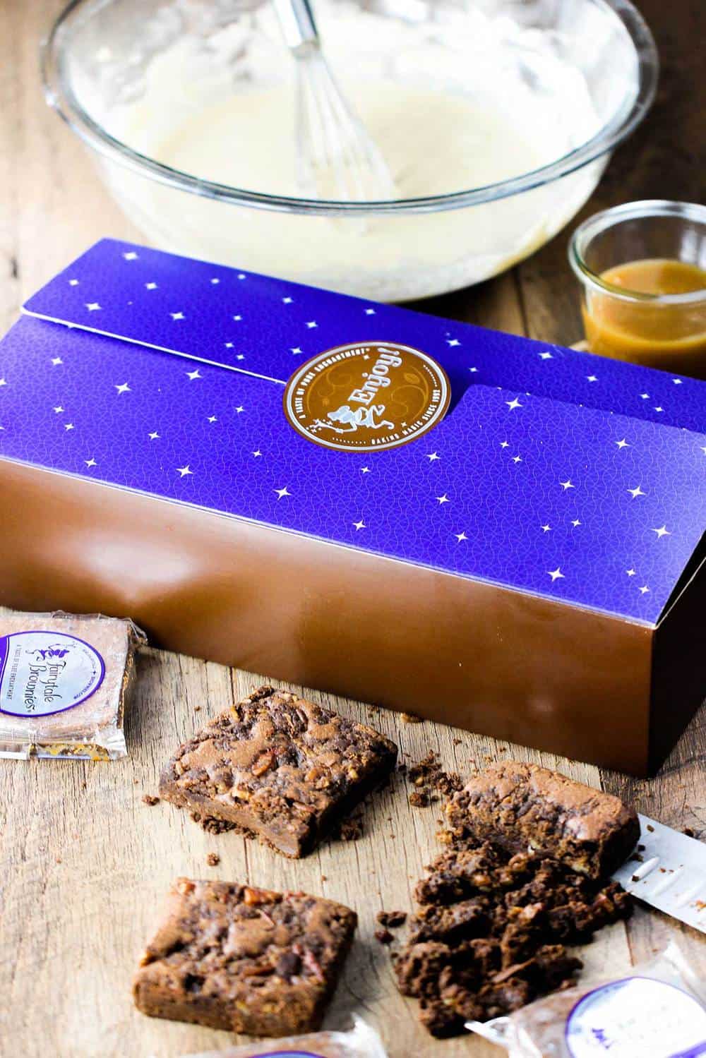 Cinnamon Cocoa brownies roughly chopped on a cutting board. 