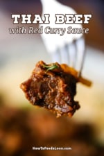 A fork that is being used to hold up a piece of Thai beef that has been slow-cooked in a red curry and coconut sauce.