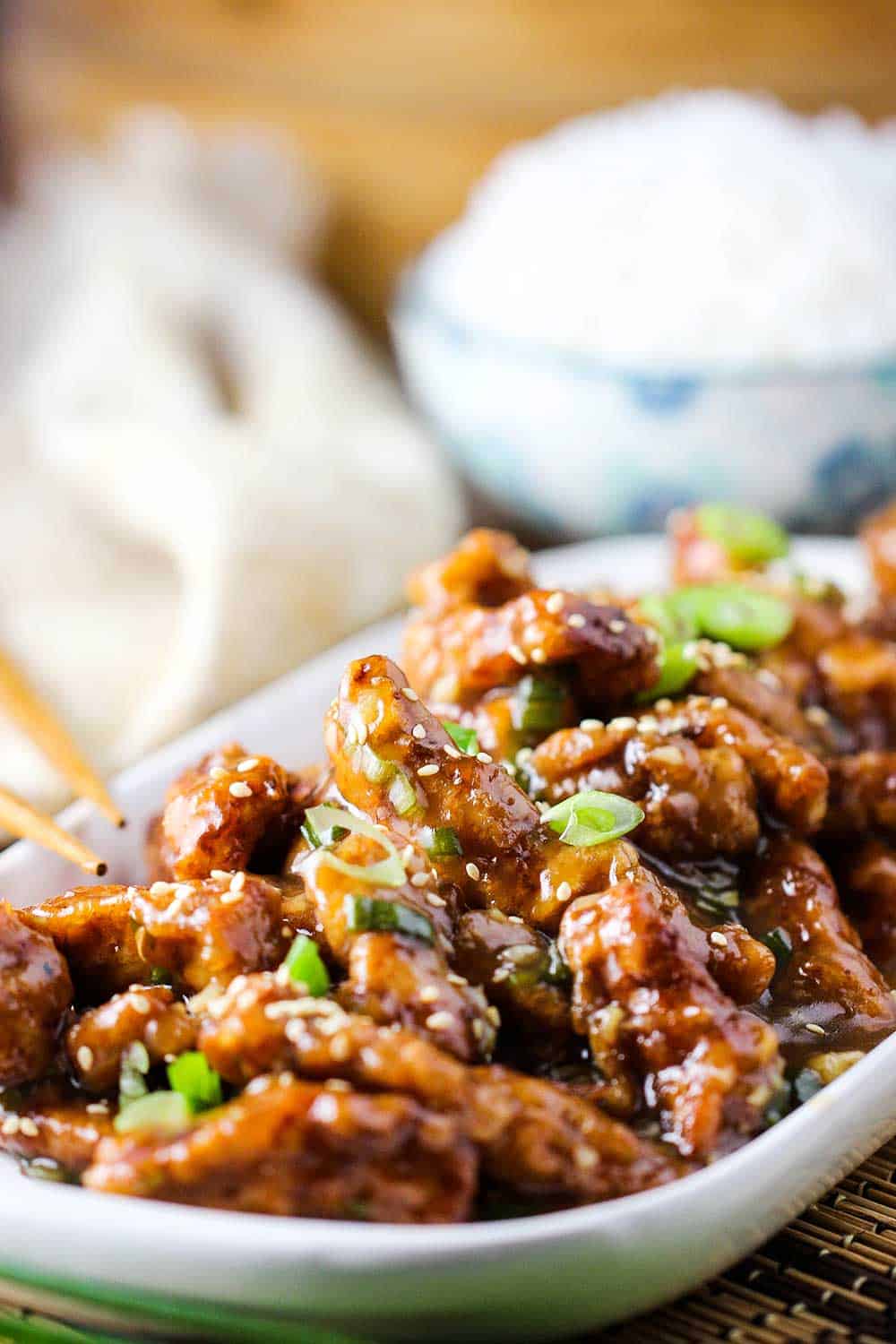 A close up view of a platter of Sweet and Sour Pork. 