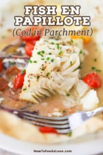 A close-up view of a fish en papillote that has been partially eaten and is resting in parchment paper with cooking liquid and steamed cherry tomatoes.