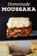 A piece of moussaka that consists of a meat sauce, potatoes, eggplant, and a thick bechamel being raised from a baking dish on a metal spatula.