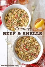 An overhead view of two white pasta bowls filled with servings of creamy beef and shells.